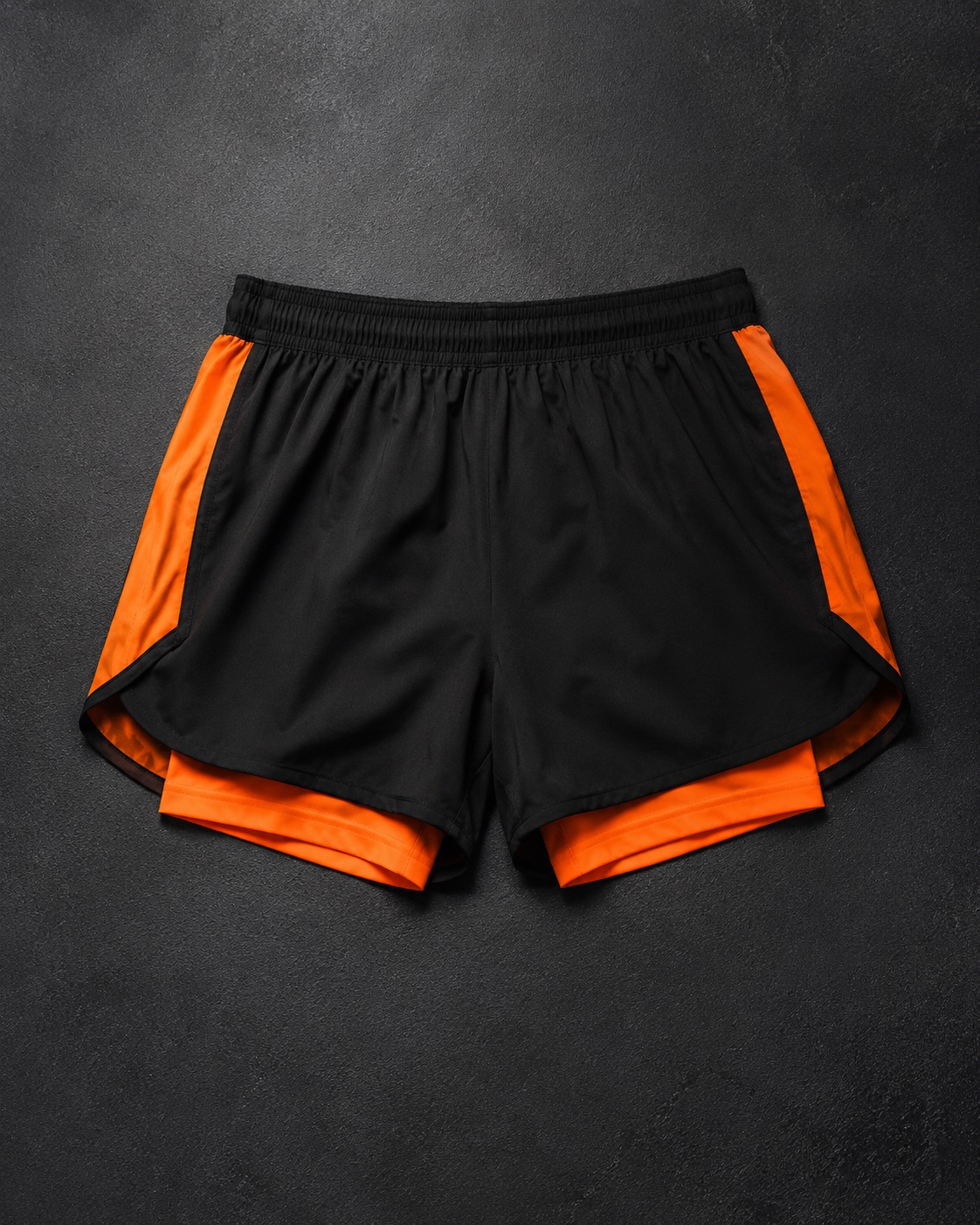 Athletics split running shorts with an inner brief, flat lay