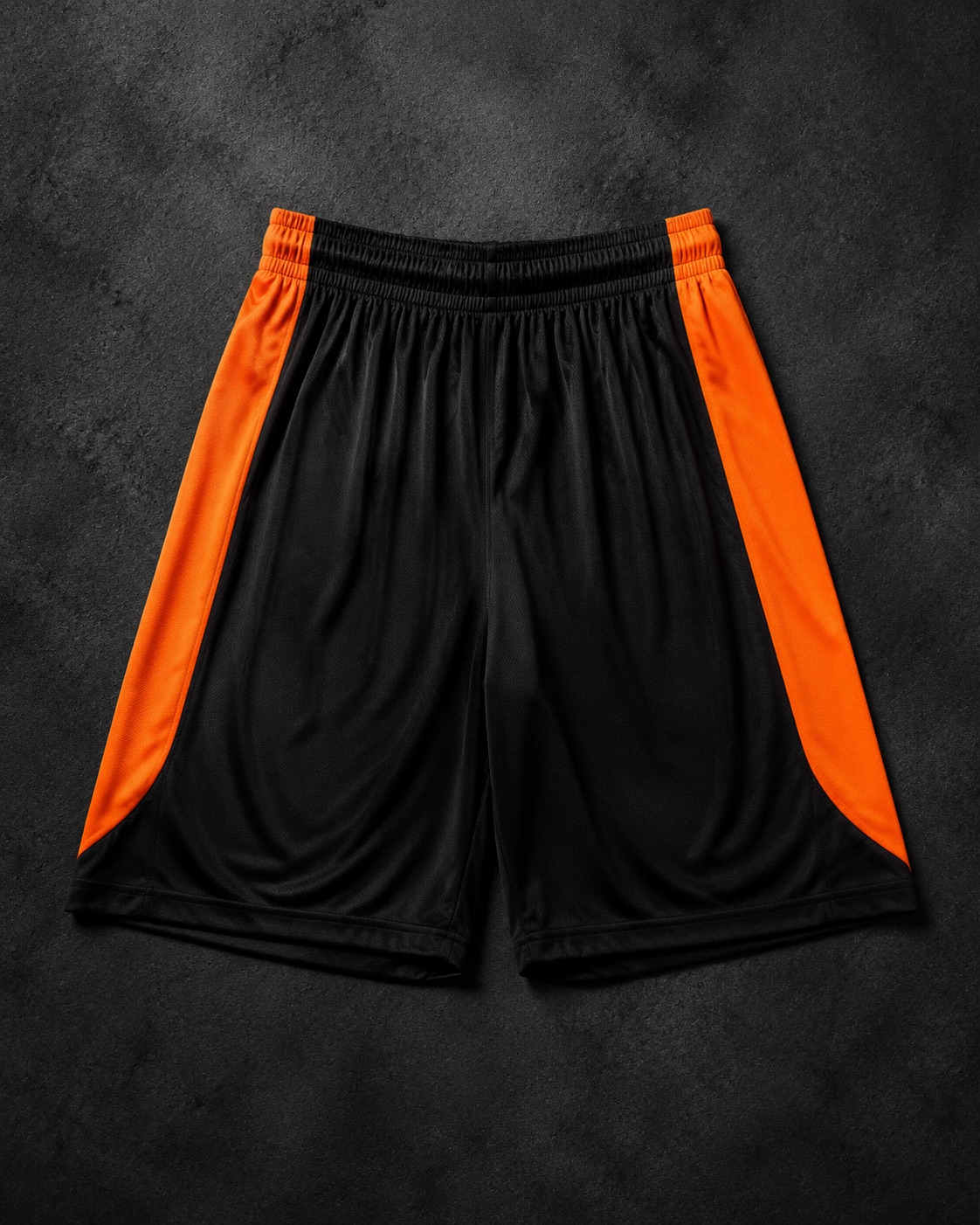 Long-cut basketball game shorts with side panels, flat lay