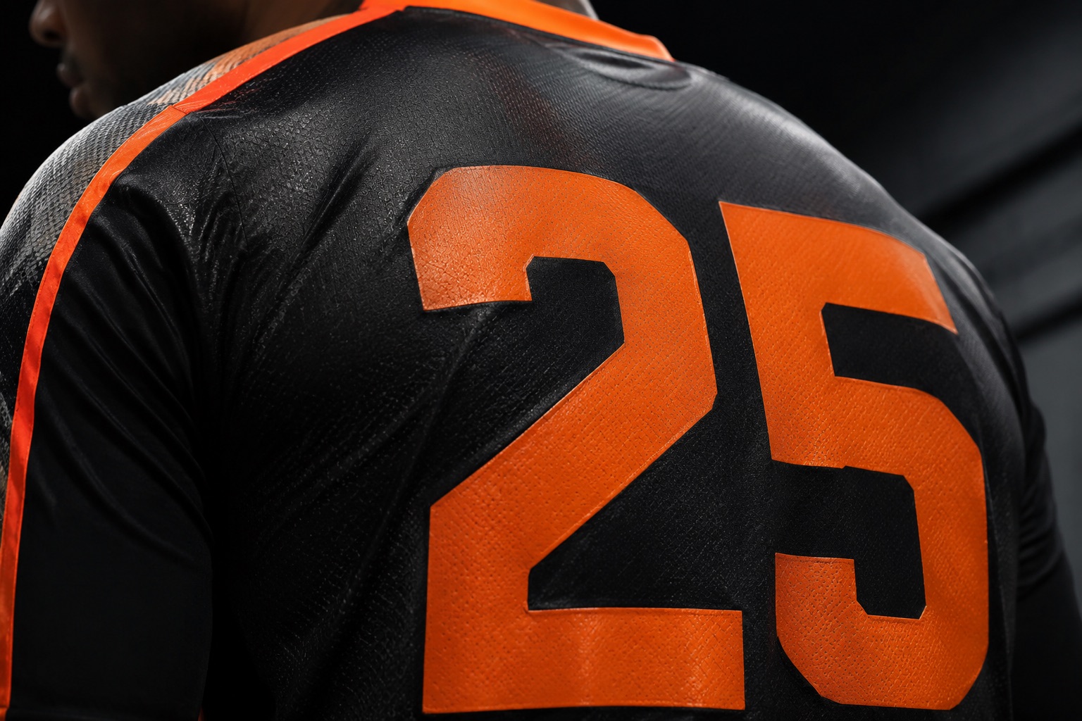 Close detail of a DTF-printed squad number on a dark jersey back