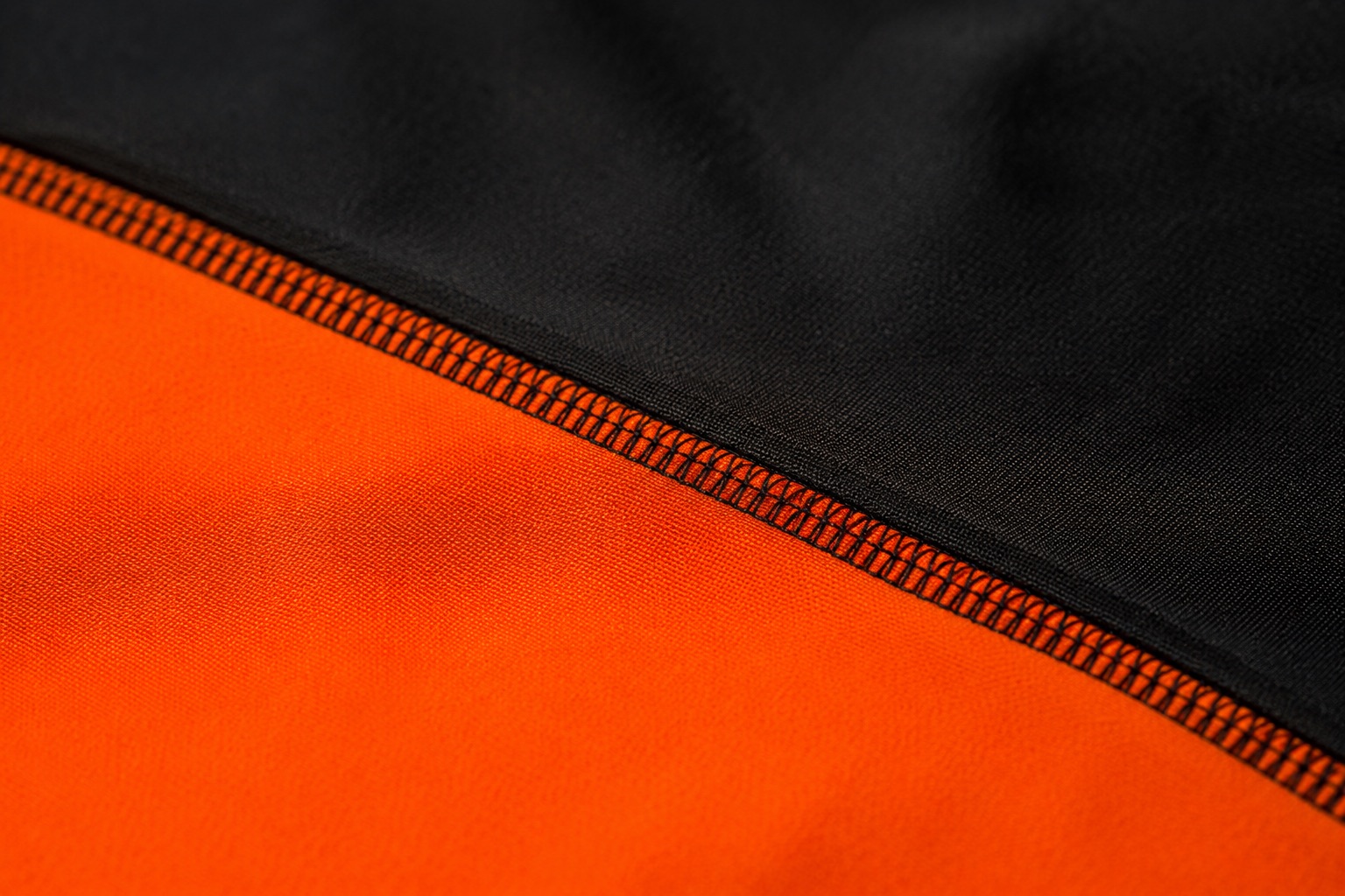 Macro of a flatlock seam joining two sportswear panels with no raised ridge