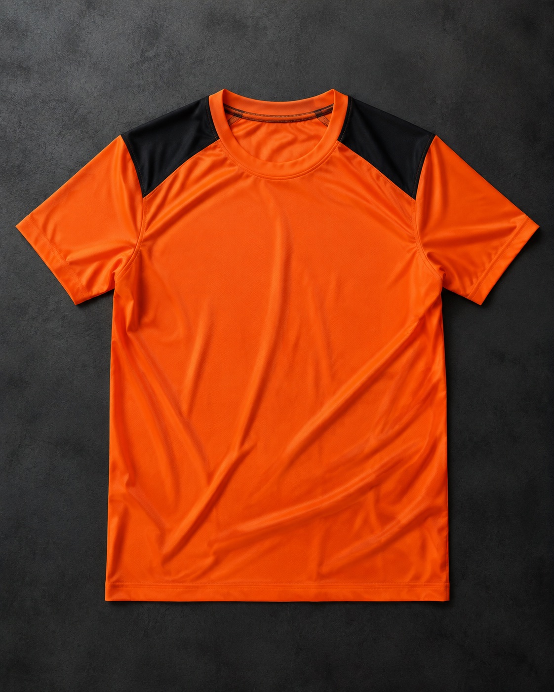 Athletics training tee with contrast shoulder panels, flat lay