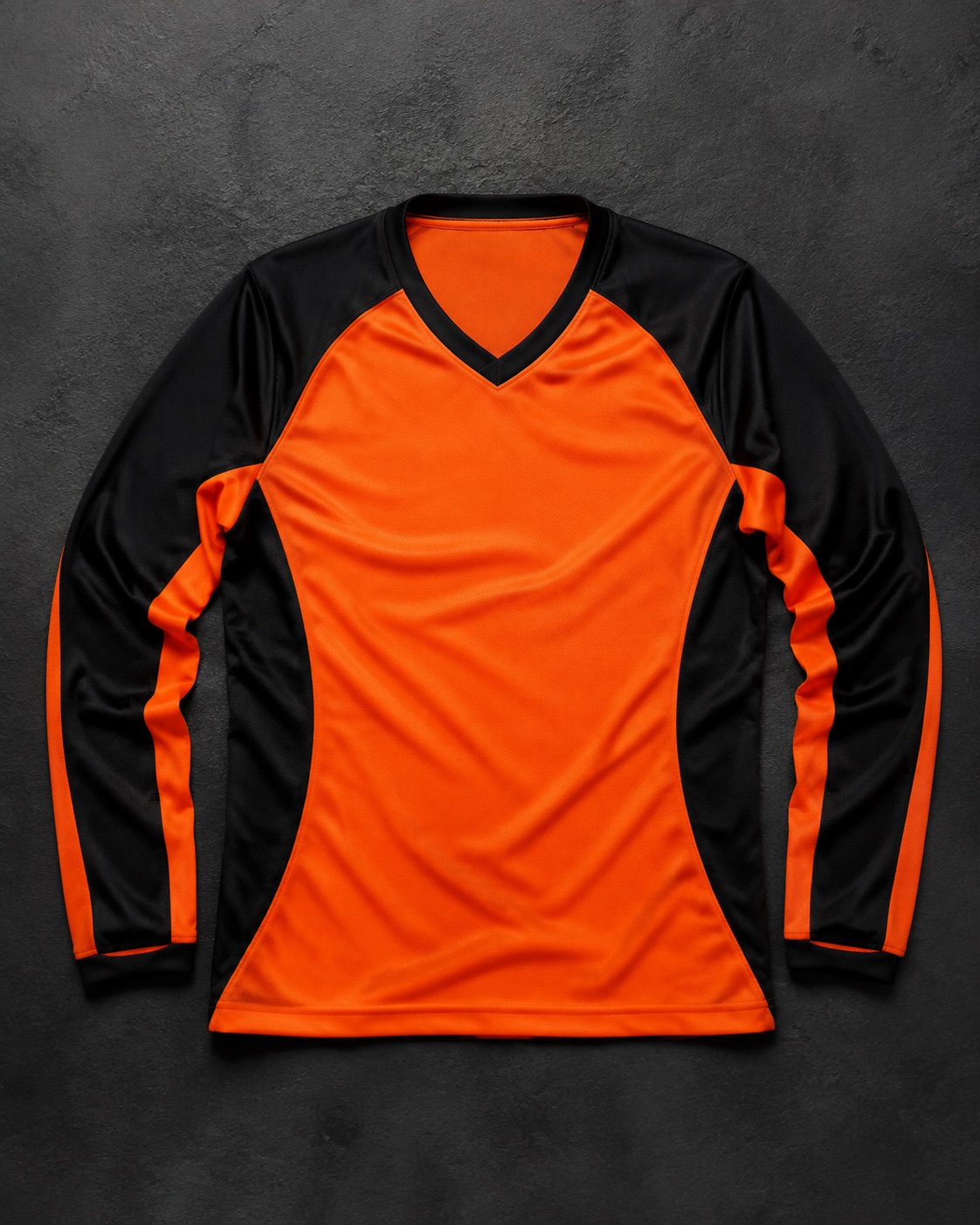 Contrasting volleyball libero jersey, flat lay on dark charcoal