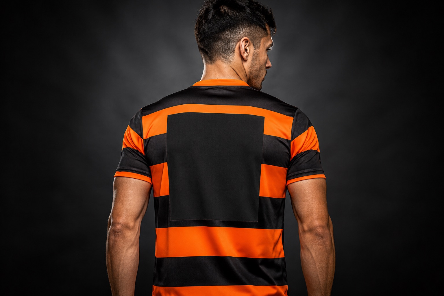 Back of a football jersey showing a large squad number on a solid backing panel