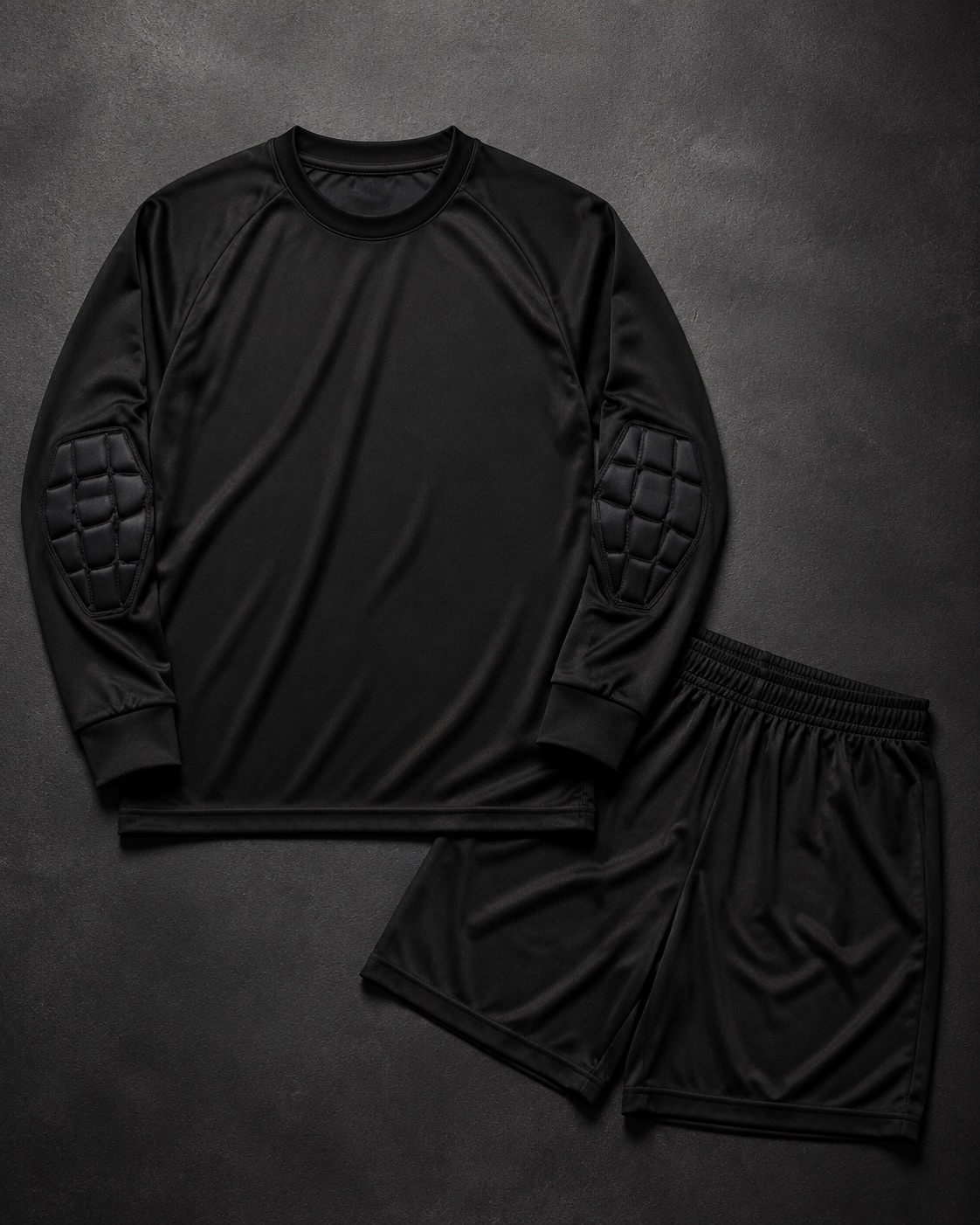 All-black long sleeve goalkeeper jersey with padded elbows and matching shorts