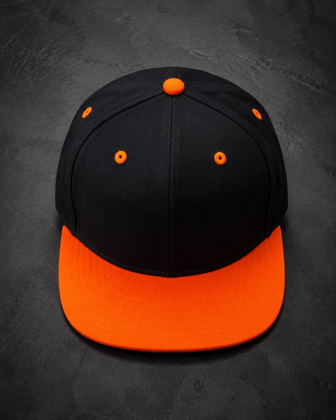 Fitted baseball cap with an embroidered front panel, flat lay