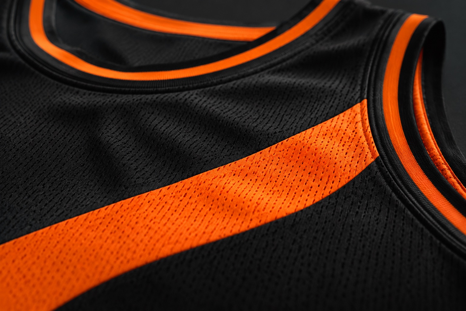 Close detail of a basketball jersey number sublimated on pro mesh fabric