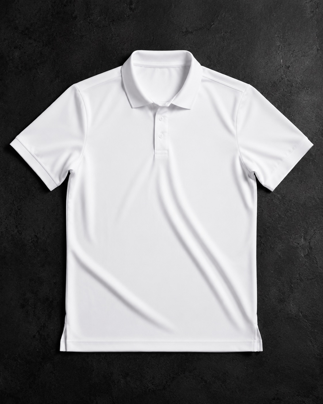 White poly-viscose cricket match shirt with a collar, flat lay on dark charcoal