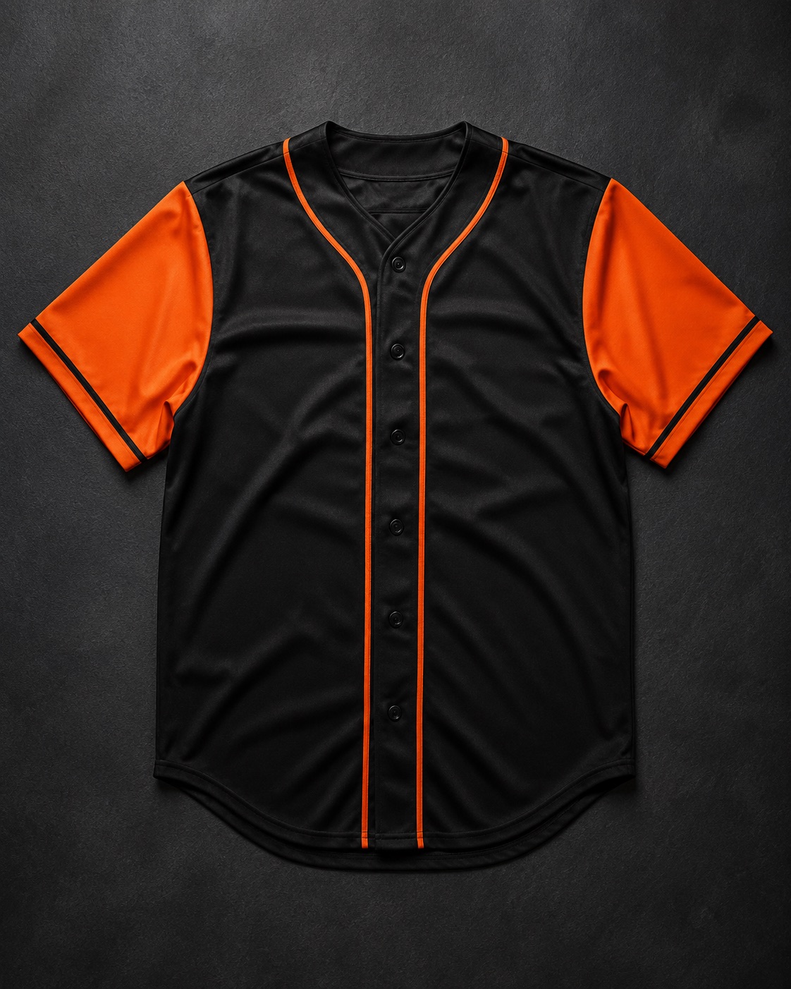 Custom full-button baseball jersey, flat lay on dark charcoal